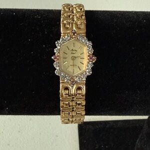 Vintage Mathey-Tissot Elegant Gold Watch with Crystal Accents